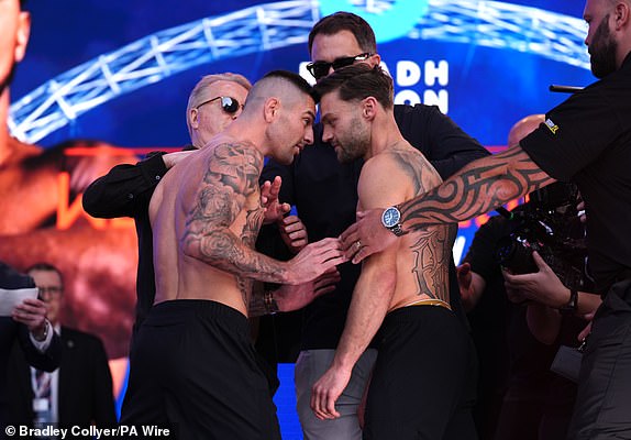 Mark Chamberlain and Josh Padley during a weigh-in at Trafalgar Square, London. The IBF heavyweight title fight between Anthony Joshua and Daniel Dubois will take place on Saturday 21st September. Picture date: Friday September 20, 2024. PA Photo. See PA story BOXING London. Photo credit should read: Bradley Collyer/PA Wire.RESTRICTIONS: Use subject to restrictions. Editorial use only, no commercial use without prior consent from rights holder.