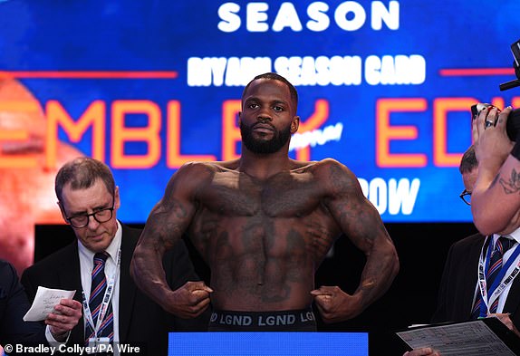 Ishmael Davis during a weigh-in at Trafalgar Square, London. The IBF heavyweight title fight between Anthony Joshua and Daniel Dubois will take place on Saturday 21st September. Picture date: Friday September 20, 2024. PA Photo. See PA story BOXING London. Photo credit should read: Bradley Collyer/PA Wire.RESTRICTIONS: Use subject to restrictions. Editorial use only, no commercial use without prior consent from rights holder.