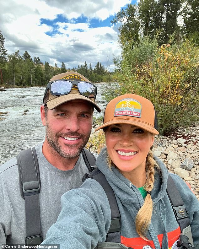 Carrie Underwood's fans blasted her as 'unrecognizable' in snaps from her recent fishing trip to Montana with her husband of 14 years, NHL star-turned-Catchin' Deers owner Mike Fisher (L)