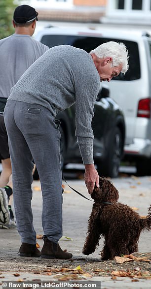 Alfie has been a companion for Phillip following his career flop and has regularly been pictured on walks with the pet