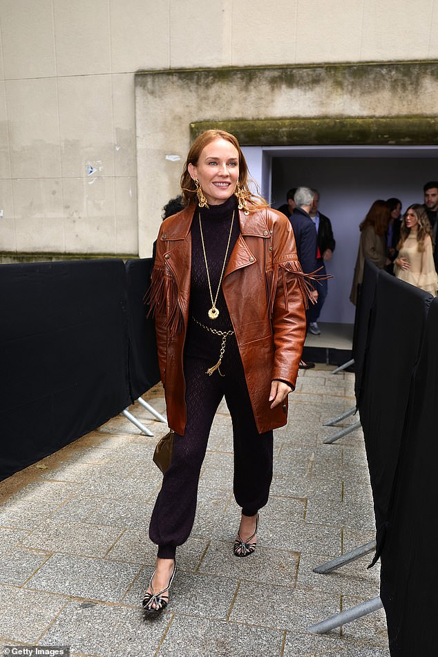 Diane beamed as she strutted her stuff in the stylish black jumpsuit