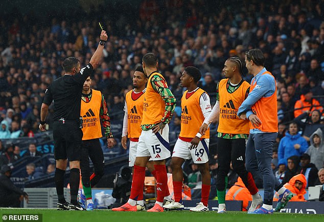 Myles Lewis-Skelly (third right) was booked before even making his Premier League debut