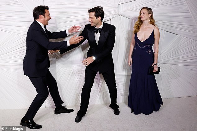 At one point, Mark struck an excited pose as he began to stroll past Jimmy Fallon during the festivities