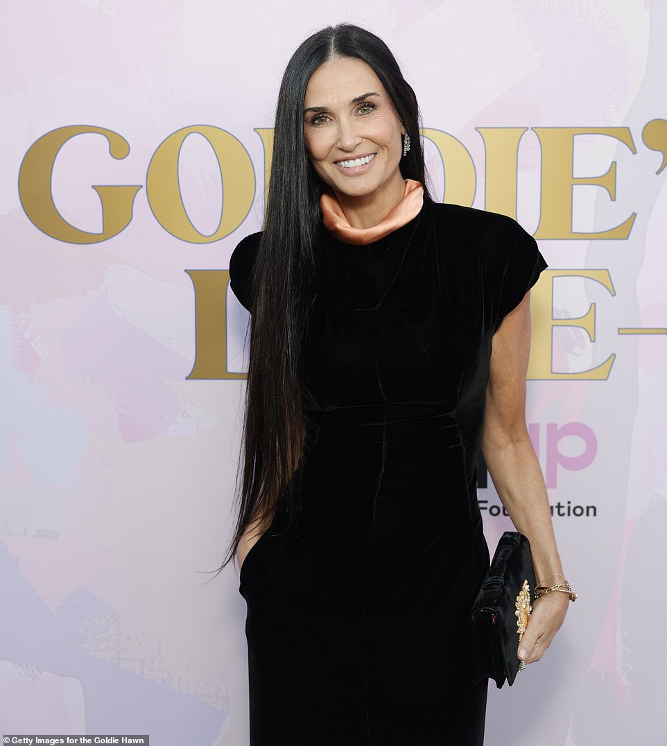 The Indecent Proposal actress donned a pair of closed-toed, black pumps to coincide with the color scheme of her outfit