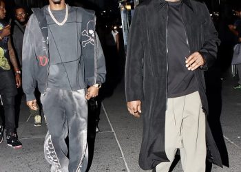 Sean Diddy Combs looks smug in last picture before arrest as celebrities react to cops finally swooping in on disgraced rapper