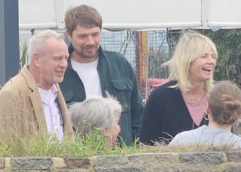Zoe Ball is comforted by Fatboy Slim ex-husband Norman Cook while taking time out from her show – as Radio 2 return date is thrown into doubt