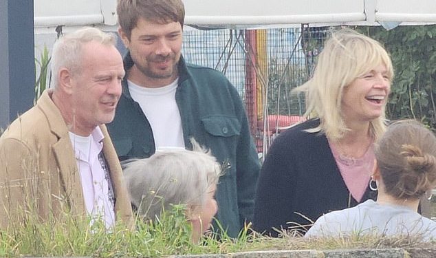 Zoe Ball is comforted by Fatboy Slim ex-husband Norman Cook while taking time out from her show – as Radio 2 return date is thrown into doubt