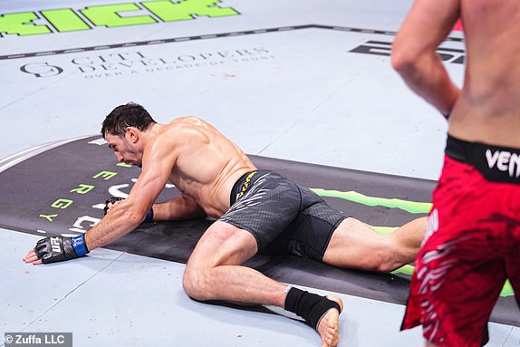 ABU DHABI, UNITED ARAB EMIRATES - OCTOBER 26: Shara Magomedov of Russia knocks out Armen Petrosyan of Russia in a middleweight fight during the UFC 308 event at Etihad Arena on October 26, 2024 in Abu Dhabi, United Arab Emirates.  (Photo by Chris Unger/Zuffa LLC)