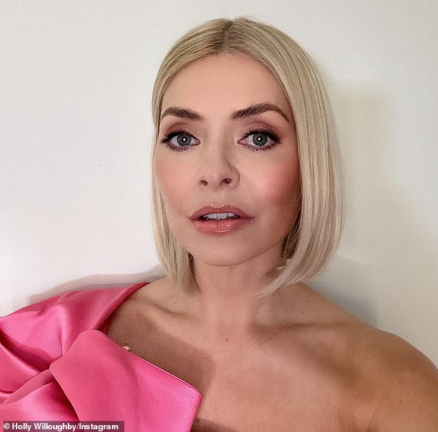 It comes amid reports Holly is enjoying her new solo career after leaving This Morning and becoming 'free' from Phillip