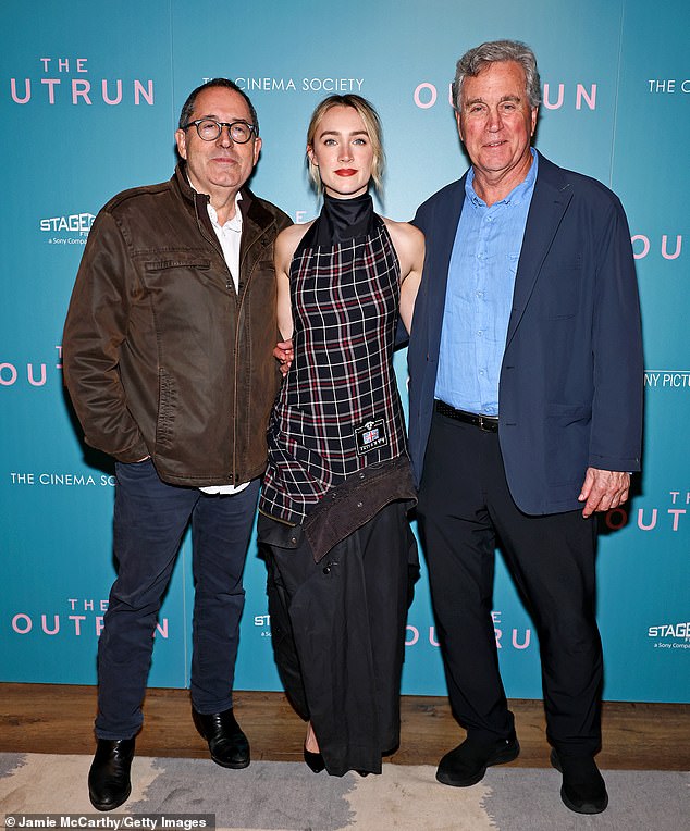 While a the screening, Saoirse posed with Sony Classic Pictures co-presidents Michael Barker (L) and Tom Bernard (R)