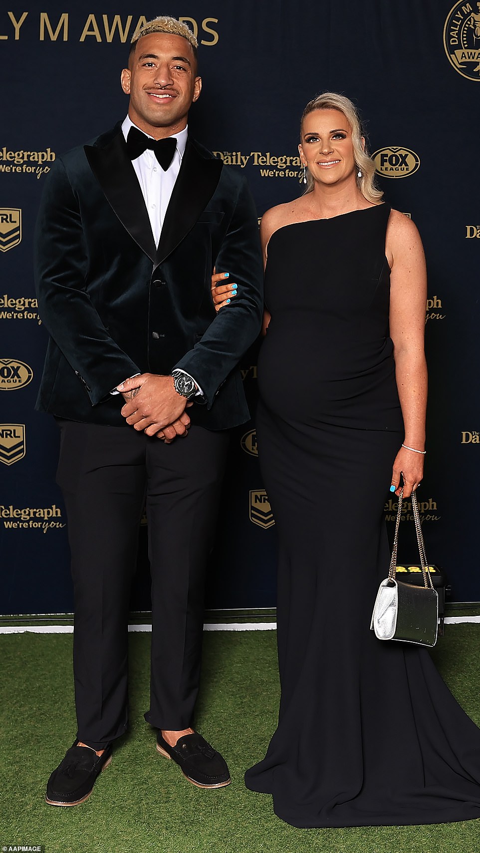 Viliame Kikau's pregnant partner Brittany Carey showed off her growing baby bump in a stunning black one-shoulder gown