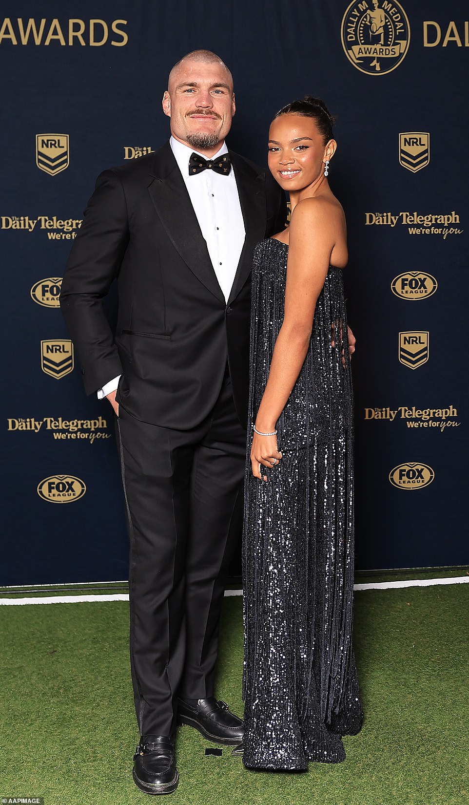 Angus Crichton's new partner Chloe Esegbona wore a glittering silver fringed gown