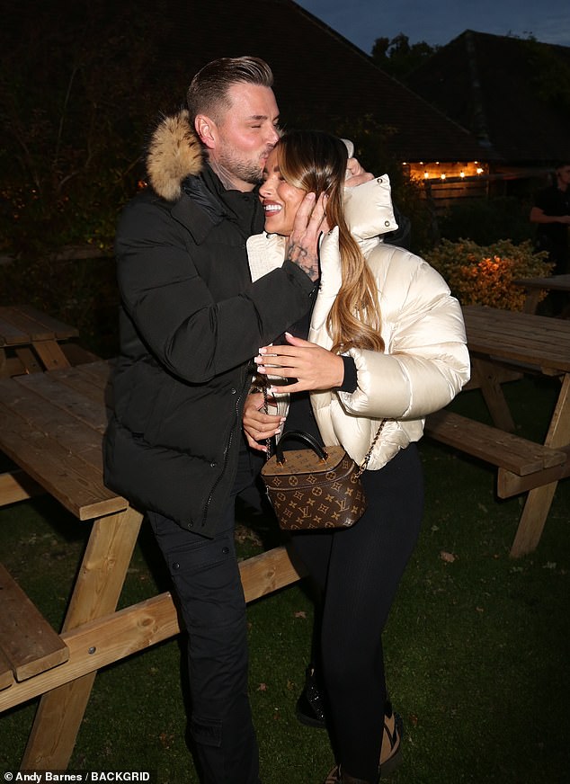 Carl who was engaged to Katie looked very loved up with his new girlfriend and in one picture could be seen fondly kissing her on the head