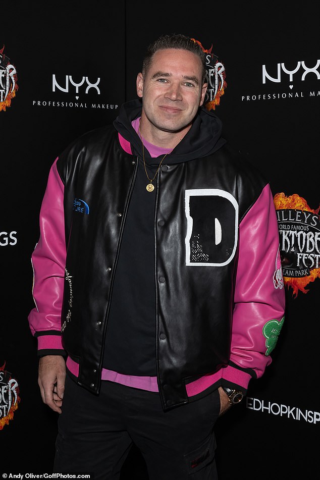 Kieran Hayler who married Katie and who shares two children with, stood out from the crowd in a black and pink leather jacket