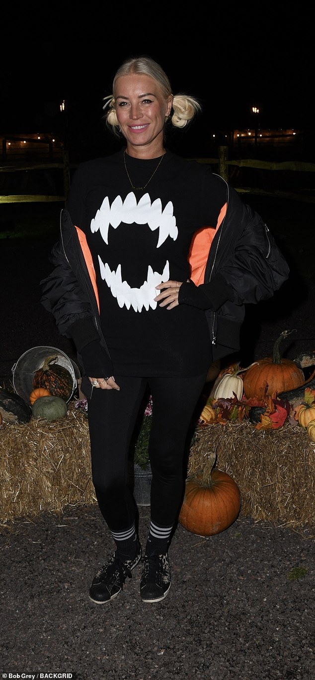 Denise Van Outen showed off her playful side as she made a bold entrance at the West Sussex farm in a top which had some fangs emblazoned across the front
