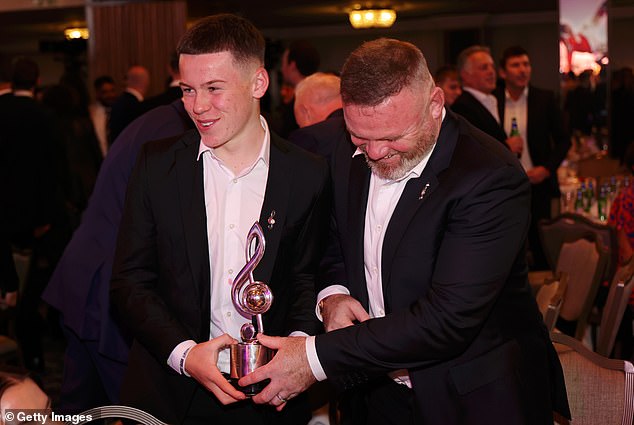 Wayne was every inch the proud dad as he attended the awards with his son Kai