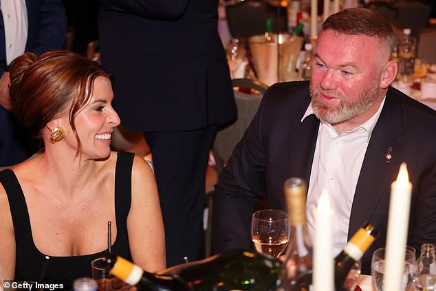 Coleen Rooney and her husband Wayne proved their marriage is stronger than ever as they enjoyed a family night out with their son Kai at the Legends Of Football Awards on Monday