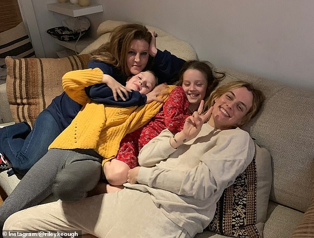 Another was taken as Keough and her sisters sat next to their late mother on a couch while posing for a memorable photo together