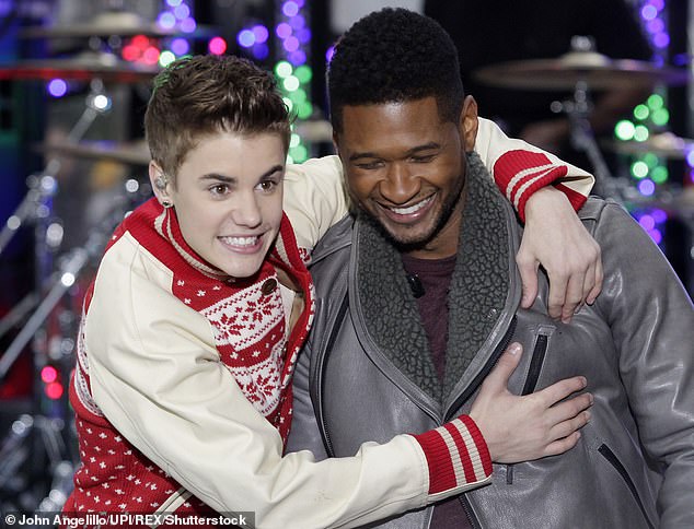 Justin Bieber, 17, and Usher perform on NBC's "Today" Show at Rockefeller Center in November 2011