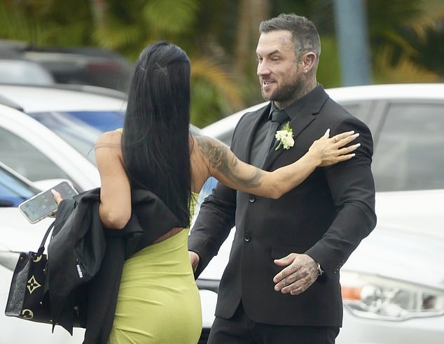 The groom mingled with guests outside the venue