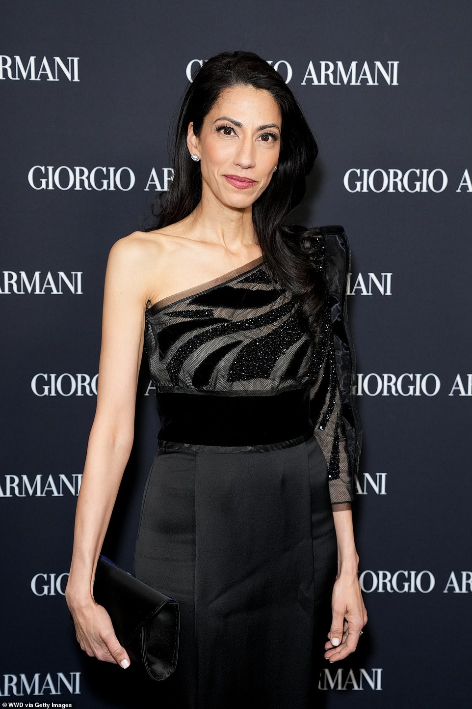 The author, 48, rocked a matte pink lip that matched the rosy blush on her cheeks