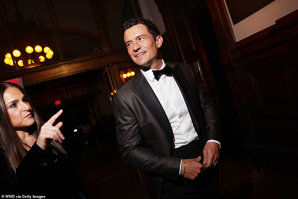Orlando looked to be the life of the party as he mingled with fellow A-list attendees ahead of the show