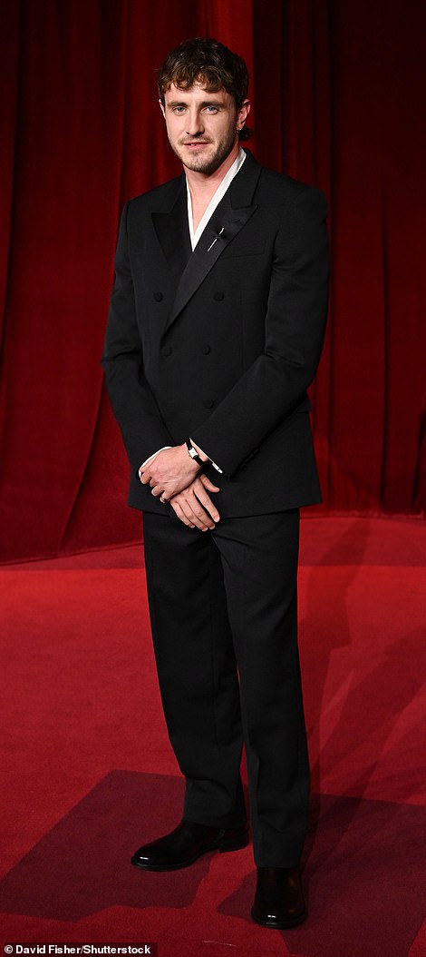 Paul Mescal looked handsome in a classic black suit with satin lapels and double buttons