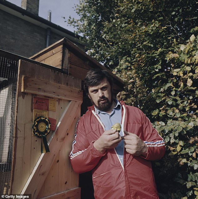 Worlds Strongest man and budgerigar breeder Geoff Capes from Great Britain with one of his budgerigars on 1st September 1978