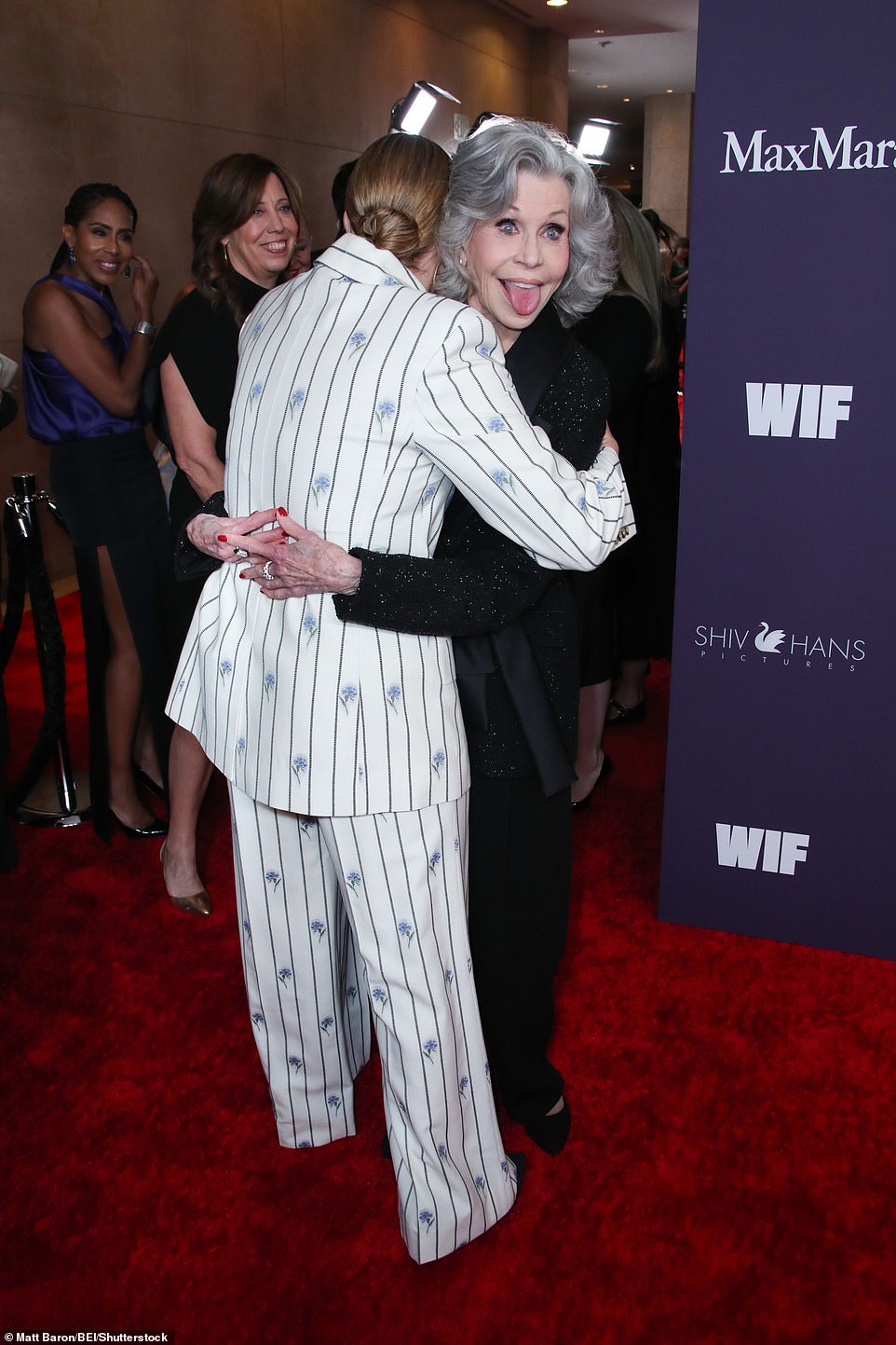 The 86-year-old playfully stuck out her tongue for the cameras while giving Winslet a hug