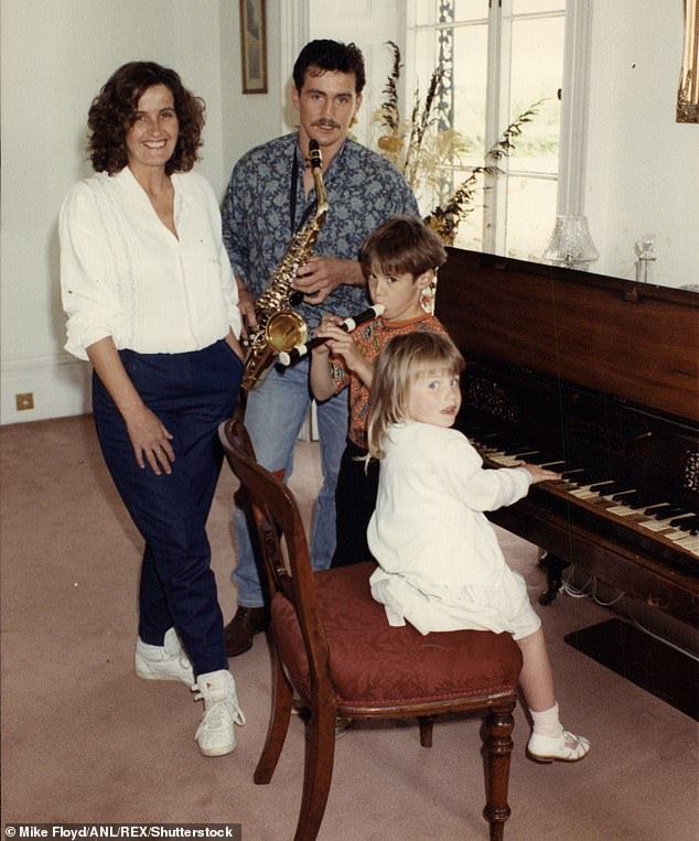 Barry is pictured alongside his wife Sandra, one of his sons and his daughter Danika