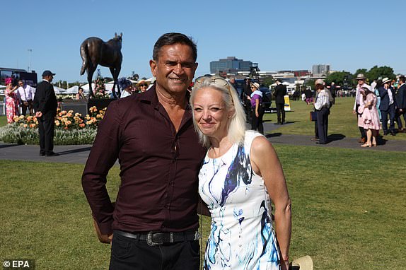 epa11701610 Former AFL player Nicky Winmar (L) and Bernie Reddington (R) attend the 2024 Melbourne Cup at Flemington Racecourse in Melbourne, Australia, 05 November 2024.  EPA/CON CHRONIS AUSTRALIA AND NEW ZEALAND OUT