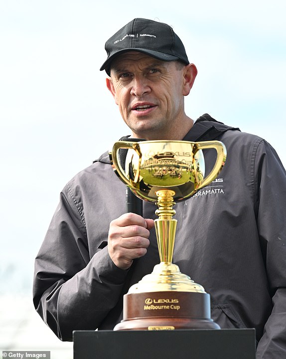 MELBOURNE, AUSTRALIA - NOVEMBER 04: Trainer Chris Waller is seen during a Melbourne Cup Media Call in front of the finishing post at Flemington Racecourse on November 04, 2024 in Melbourne, Australia. (Photo by Vince Caligiuri/Getty Images)