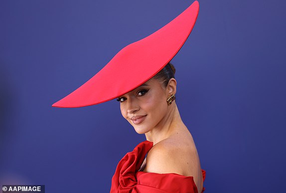 Olivia Molly Rogers poses for photographs at the 2024 Melbourne Cup at Flemington Racecourse in Melbourne, Tuesday, November 5, 2024. (AAP Image/Con Chronis) NO ARCHIVING, EDITORIAL USE ONLY