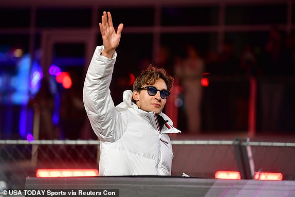 Nov 23, 2024; Las Vegas, Nevada, USA; Mercedes AMG Petronas driver George Russell (63) is introduced before the Las Vegas Grand Prix at Las Vegas Circuit. Mandatory Credit: Gary A. Vasquez-Imagn Images