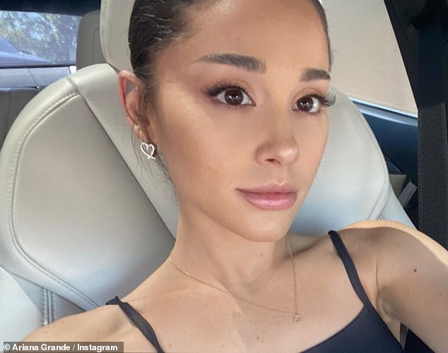 While the star was known for her long eyelashes and dark smokey eyeshadow, she has now adapted a more bare-faced look (pictured 2022)