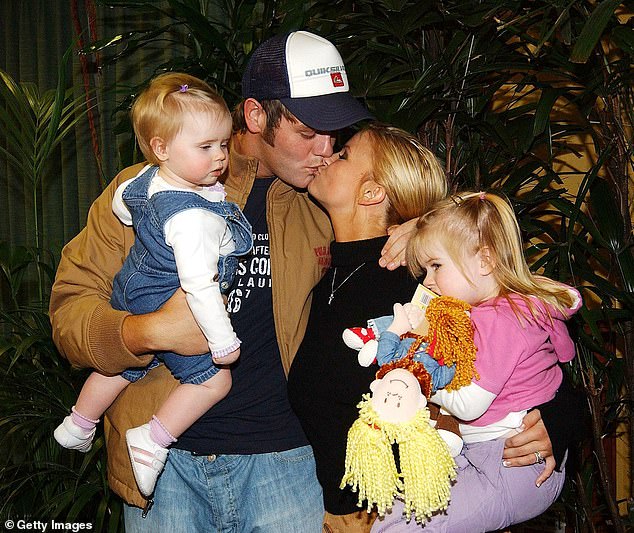 She shares daughters Molly, 22 and Lilly, 20 with her ex husband Brian McFadden who she was married to from 2002¿2006 (Kerry, Brian, Lilly and Molly seen in 2004)