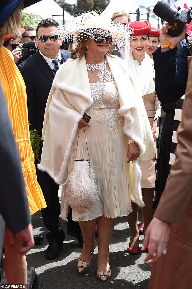 Mining magnate Gina Rinehart also turned heads at Melbourne Cup Day in 2016 thanks to the dizzying amount of haberdashery trimmings that embellished her look