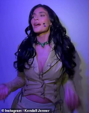 Kylie, who was dressed as Isabella in the height of early noughties fashion, looked incredible in her green jacket and long flowing skirt with sparkly boots