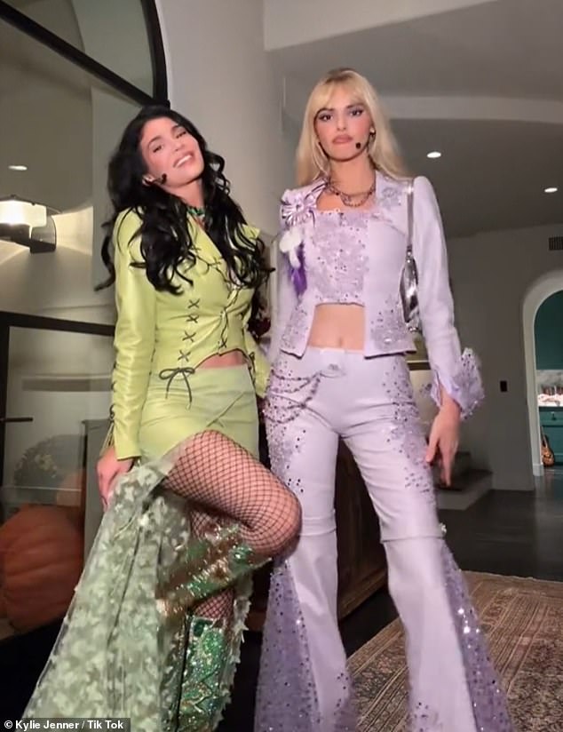 Kylie Jenner and her sister Kendall won the praise of fans for their 'iconic' Halloween costume choice this year after taking inspiration from the Lizzie McGuire movie