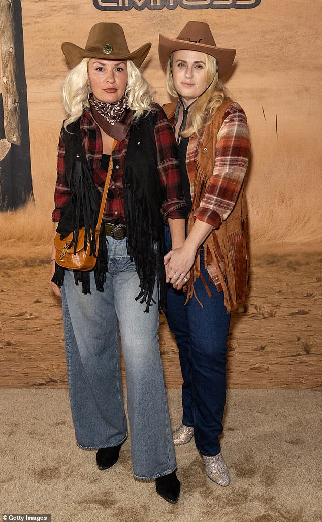 The Aussie actress' fun Western-inspired was teamed with a suede tasselled jacket and straight leg jeans