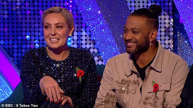 Amy seemed to be in high spirits as she chatted to host Janette Manrara , looking glamorous in a glitzy blue two-piece suit