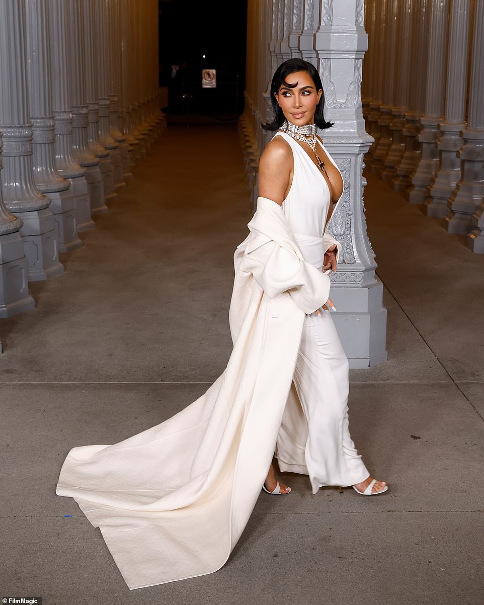 She donned white, patent leather sandal heels to complete her monochromatic look and even showed off a crisp, white manicure