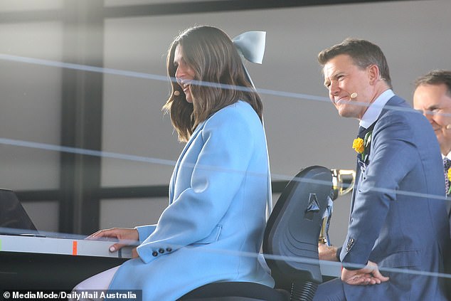 Sarah was joined by her co-host Alex, 43, who looked dapper in a navy suit as he got ready for their busy day of broadcasting duties