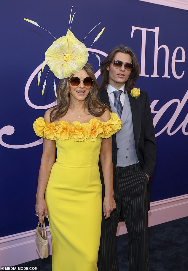 She was joined at the festivities by her son Damian, 22, and they were seen enjoying the quality mother-son time together as they posed up a storm on the carpet