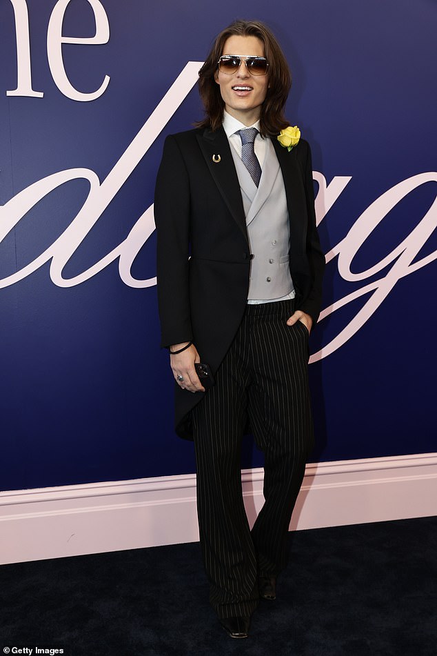 While there is no official dress code for the day, racegoers are encouraged to wear bright and bold colours, with most opting to wear all-red ensembles. Pictured: Damian Hurley