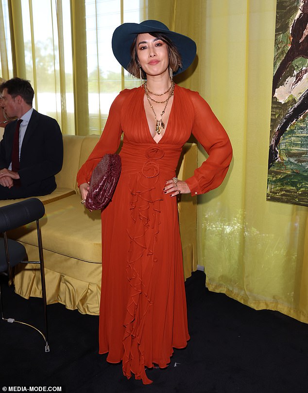 Melissa Leong also embraced the red theme for her appearance at the Cup