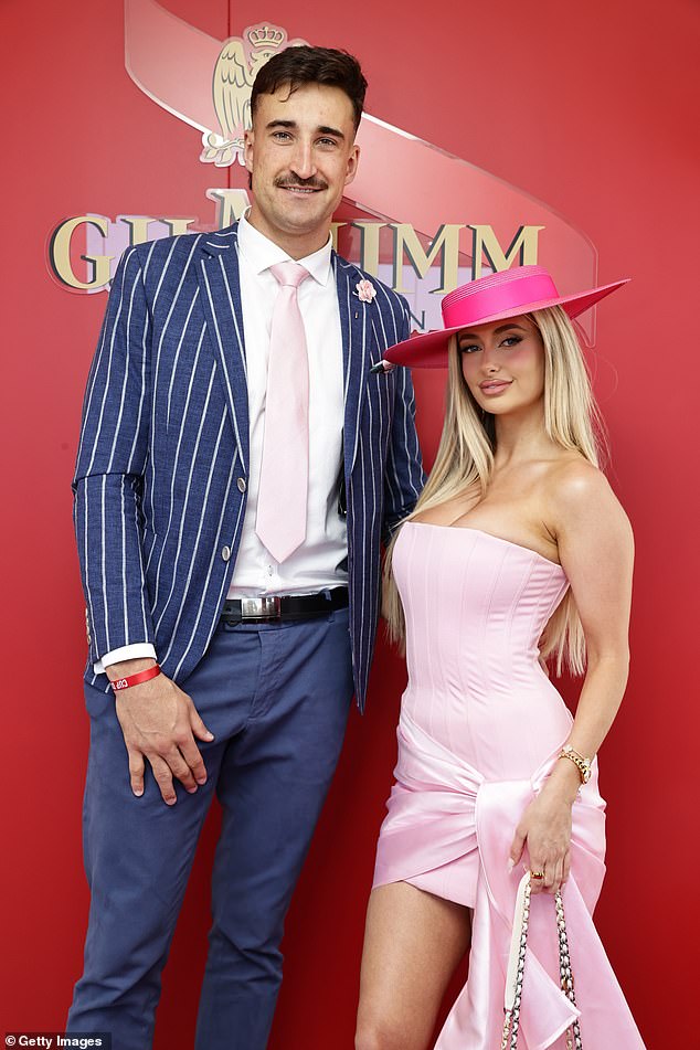 Ivan cut a suave figure in a blue suit while Chelsea made sure to capture attention in a figure-hugging pink mini dress