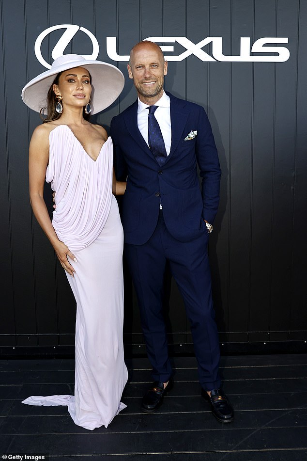 Melbourne's 'it' couple Rozalia and Nick Russian also stepped out in style as they proved themselves to be racing day veterans