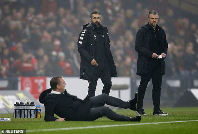 Brendan Rodgers suffered the ignominy of slipping over when he kicked the ball in frustration