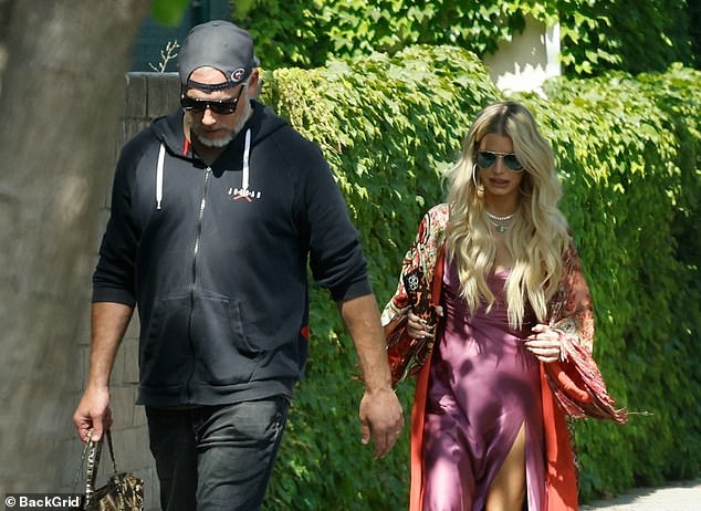 Johnson je posebno nosio svoj prsten tijekom svog posljednjeg javnog viđenja s Jessicom u lipnju - na slici